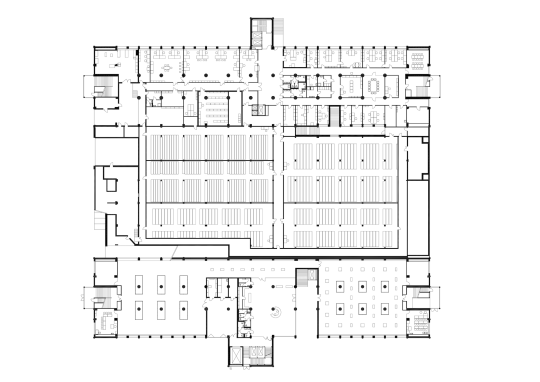 First Floor Plan: Library closed access stacks are situated between the buildings.