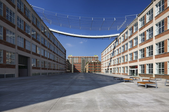 Perspective: View of both buildings and the walkable platform that connects them (looking west)
