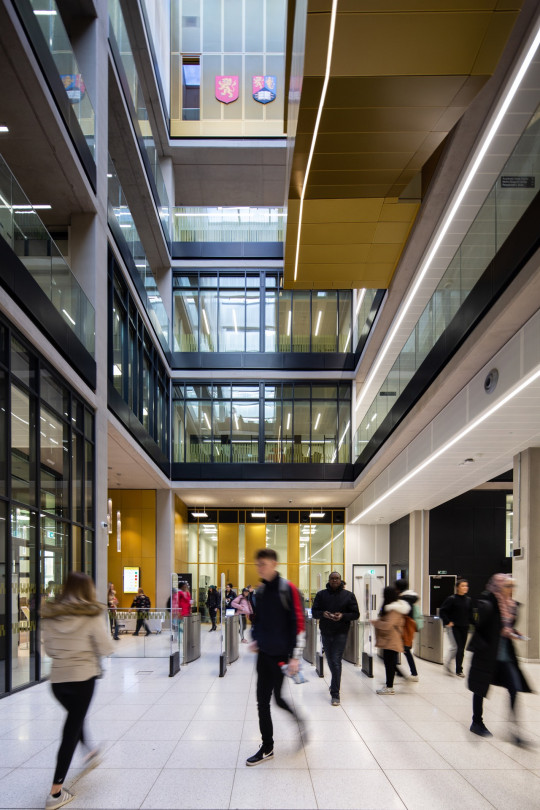 Entrance hall: A view into the library from the ground floor showing floors above and Group Study Rooms overlooking the atrium. The access control solution is shown.