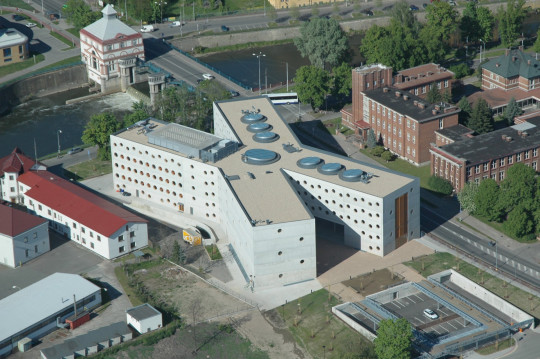 Before completion of the new building