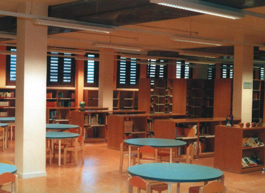 Children's section of the State Public Library in Palma de Mallorca, Spain. The windows on the background are inspired in traditional Majorcan style.
