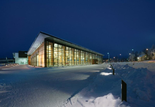 On a cold winter evening the library looks warm and inviting. -