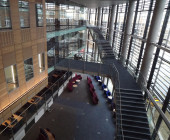 Interior view -  New east wing extension, with wood panelled individual study rooms and open reading area