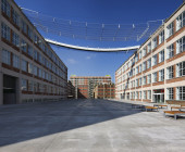 Perspective: View of both buildings and the walkable platform that connects them (looking west)