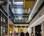 Entrance hall: A view into the library from the ground floor showing floors above and Group Study Rooms overlooking the atrium. The access control solution is shown.