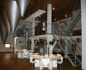 The library has conserved the particular elements of the brewery like carriages, beer cellars, silos and freezers.