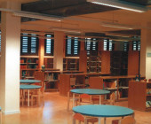 Children's section of the State Public Library in Palma de Mallorca, Spain. The windows on the background are inspired in traditional Majorcan style.