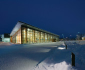 On a cold winter evening the library looks warm and inviting. -